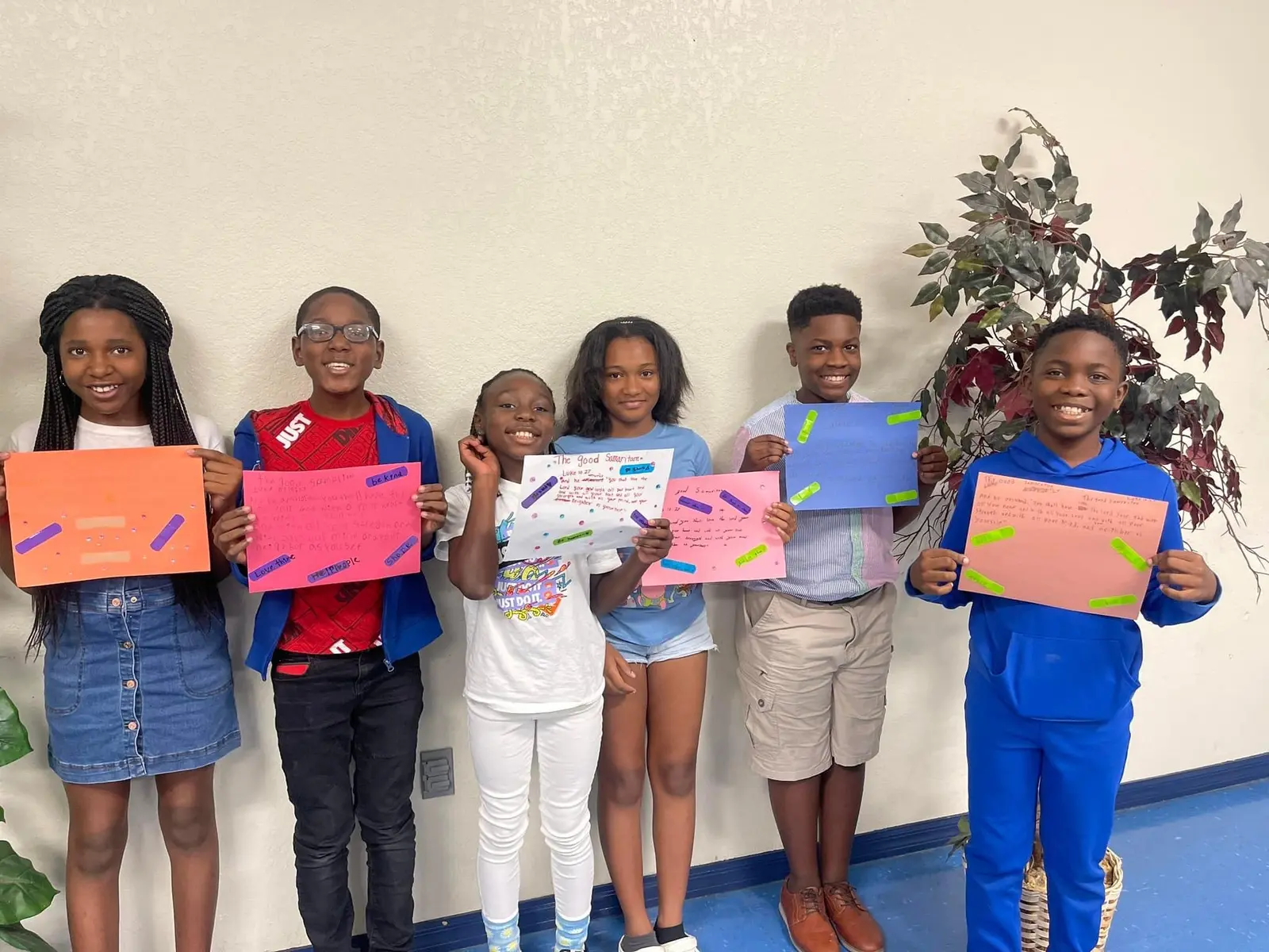 Young people presenting community service projects