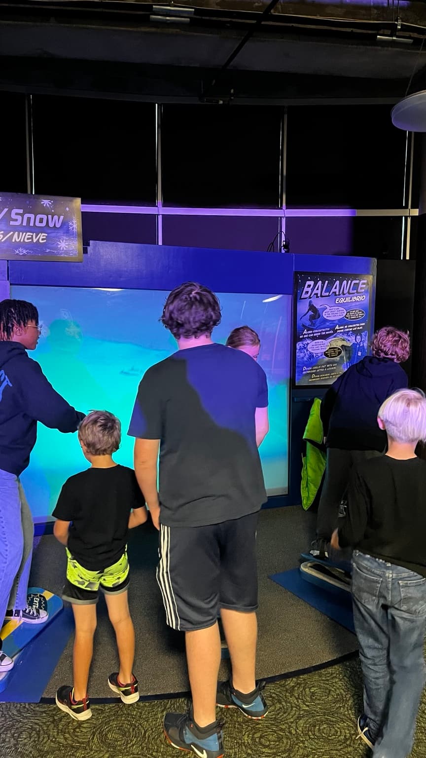 Young people participating in a science learning experience